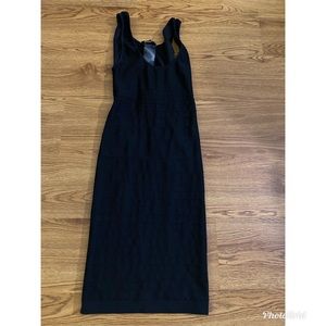 Black bebe dress with cut on the back